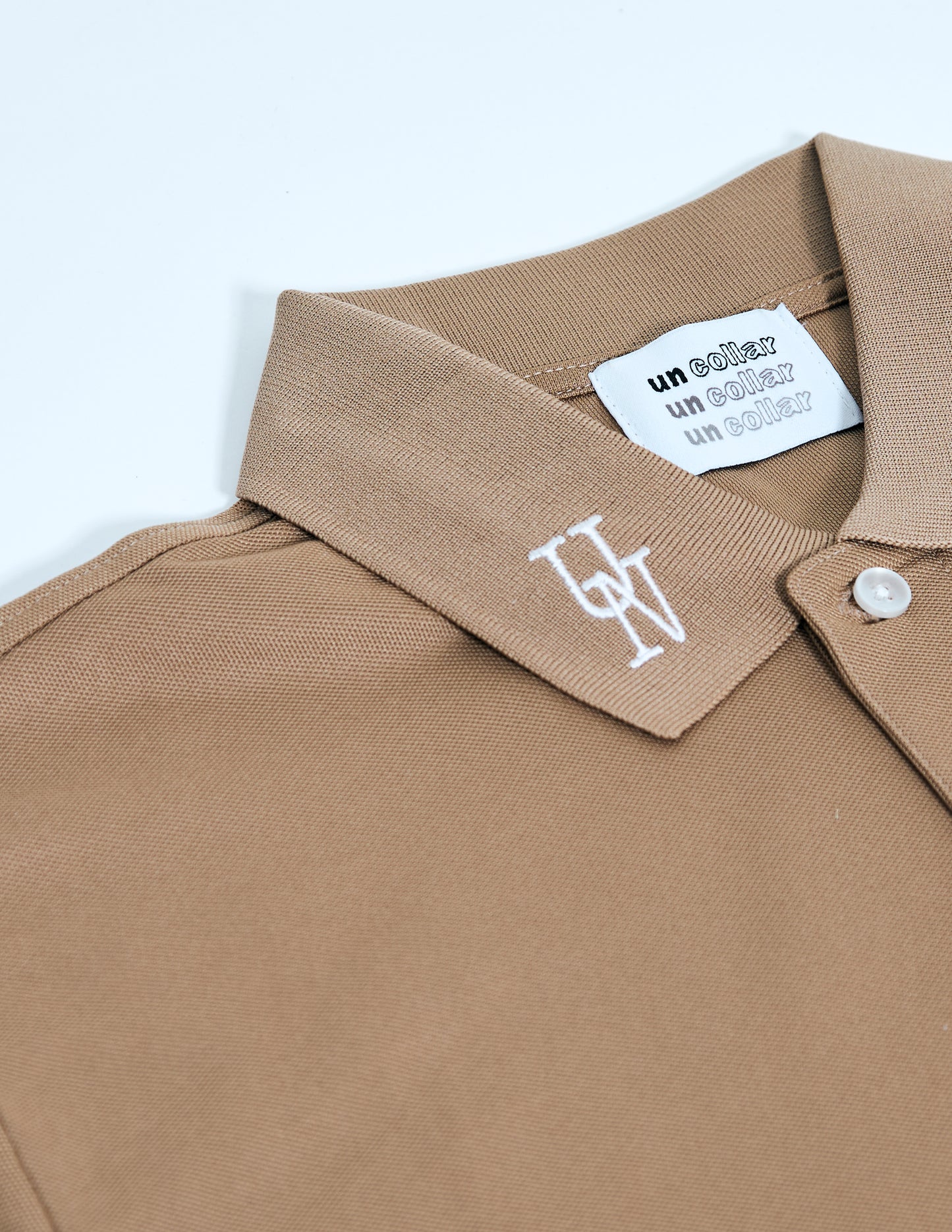 UN COLLAR DAWG POLO（Unisex）